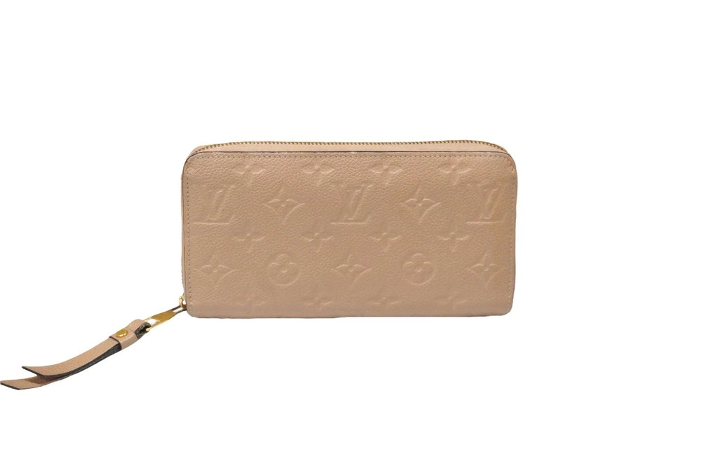 LOUIS VUITTON Zippy Wallet Tourtrell Monogram Empreinte Leather Beige Cream